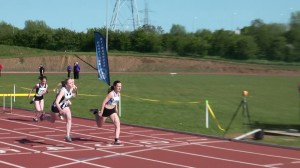 Evie Bartl dipping for line new PB 12.97 in 75m hurdles