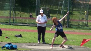 Cameron launching the shot over the magic 10m mark to 10.63m